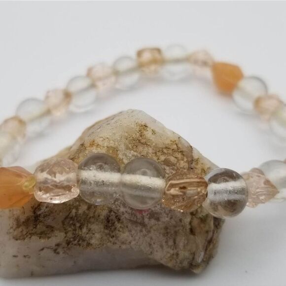 Detailed dramatic neutral‎ earth beaded bracelet